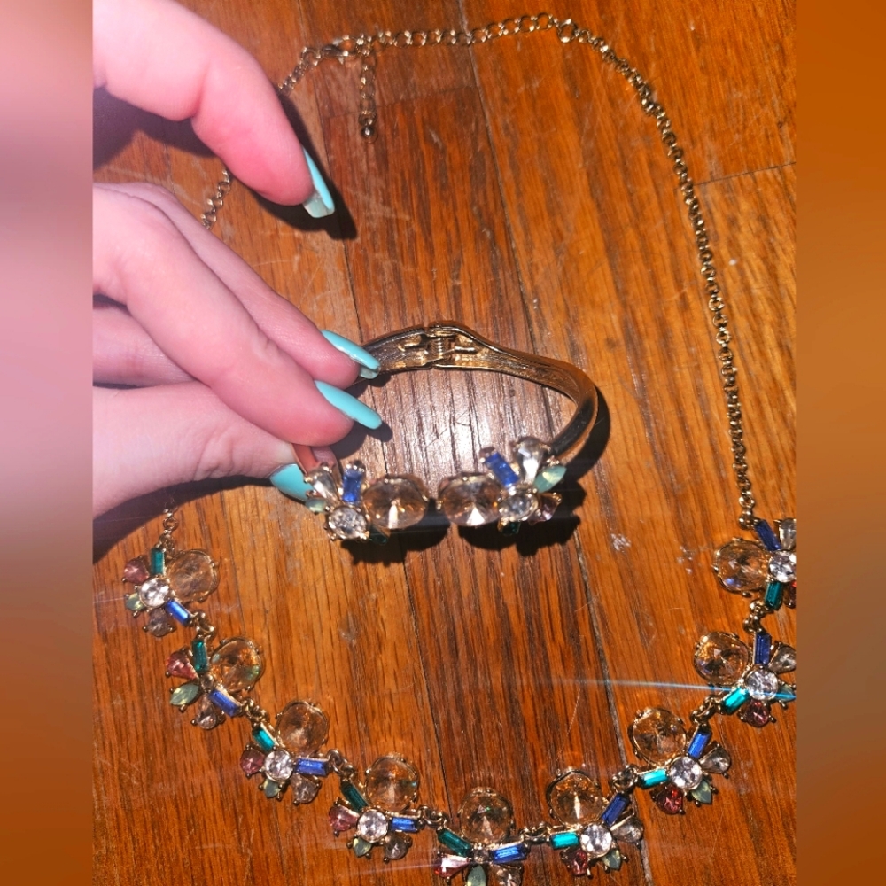Matching necklace and bracelet set with colorful pastel gemstones hangs 10"